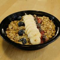 Nut Power Bowl · Banana, mixed berries, freshly ground peanut butter, topped with sliced banana, strawberries...