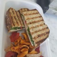 Tuscano Panini. Low Calories · Multigrain bread, provolone, spinach, turkey, roasted red peppers, and pesto.