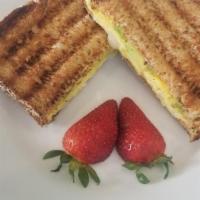Egg white panini · Multigram Bread filing with eggwhite, provolone and Hummus