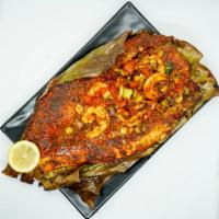 Whole Bronzino (SINGARI)  · Butterflied Stuffed with shrimp, Calamari, and vegetables 