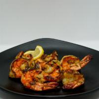 Grilled Black Tiger Shrimp Plater (1/2 lb.) · Comes with two sides
(All Dishes cooked with Extra virgin olive oil)