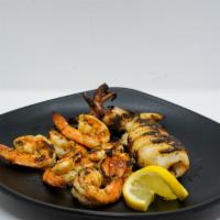 Mixed Grilled Calamari and Shrimp · Served with choice of 2 sides
(All Dishes cooked with Extra virgin olive oil)