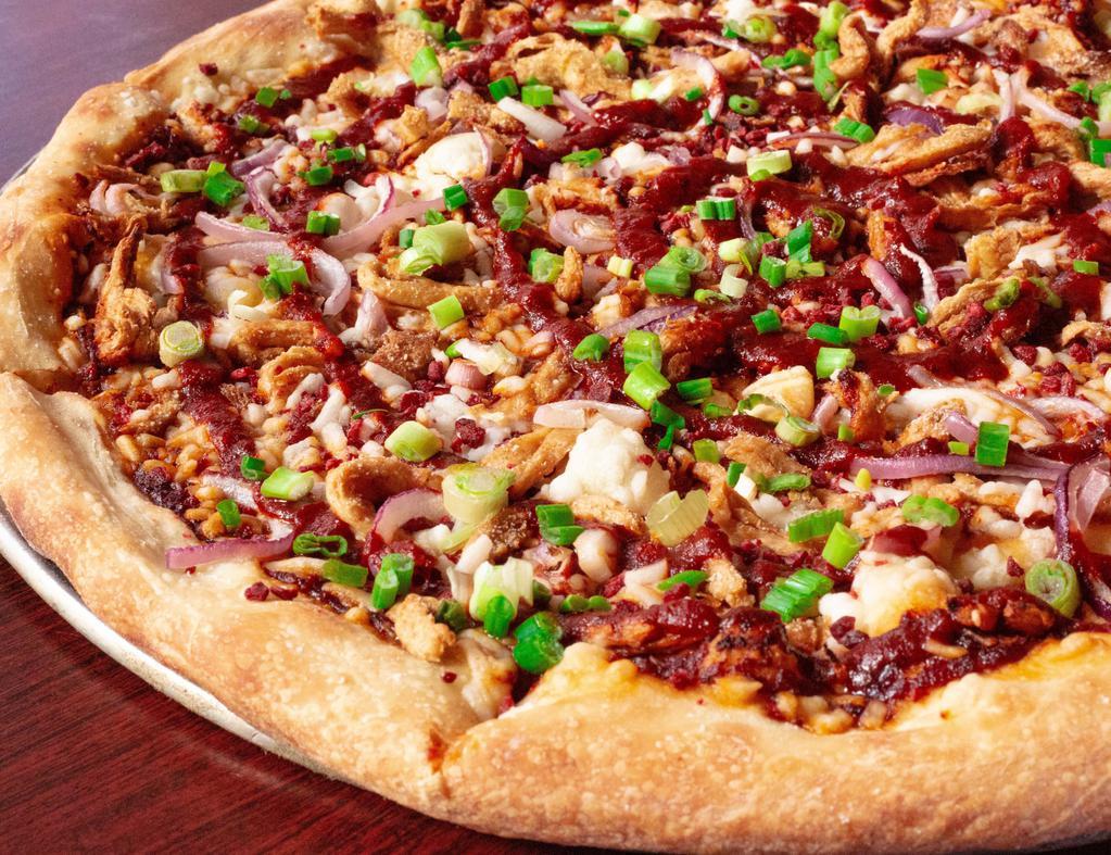 BBQ Soy Curl Pie · BBQ sauce base, vegan mozzarella cheese, bacon bits, BBQ soy curls, red onions, and scallions.