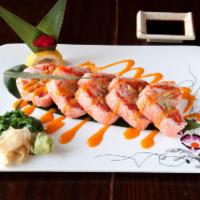 Magic Roll · 10 pieces. Spicy crunch tuna, kani, shrimp avocado and masago wrapped with soy bean seaweed.