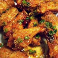 A2. Fried Wings with Fish Sauce · Canh ga chien nuoc mam.