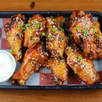 GH Wings · 10 WINGS
MILD, MEDIUM, HOT, BBQ, Thai Chili Sriracha 
