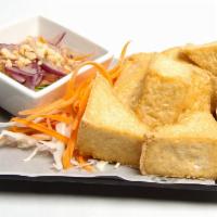 8 Piece Fried Tofu · Fried tofu served with homemade sweet and sour sauce sprinkle with roasted ground peanuts.