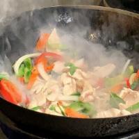 Basil Stir Fried · Sliced meat stir fried with garlic sauce, onions, bell peppers, carrots, scallions, and fres...