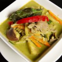 Green Curry · Green Curry with eggplant, bambu shoots, bell peppers and Thai basils. Spicy.
