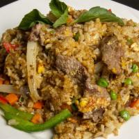 Basil Fried Rice · Stir fried rice in garlic chili sauce with white onions, carrots, broccoli, bell peppers and...