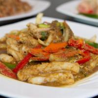 Stir Fried Squid with Yellow Curry · Stir fried squid, white onions, green onions, bells peppers and egg served with white jasmin...
