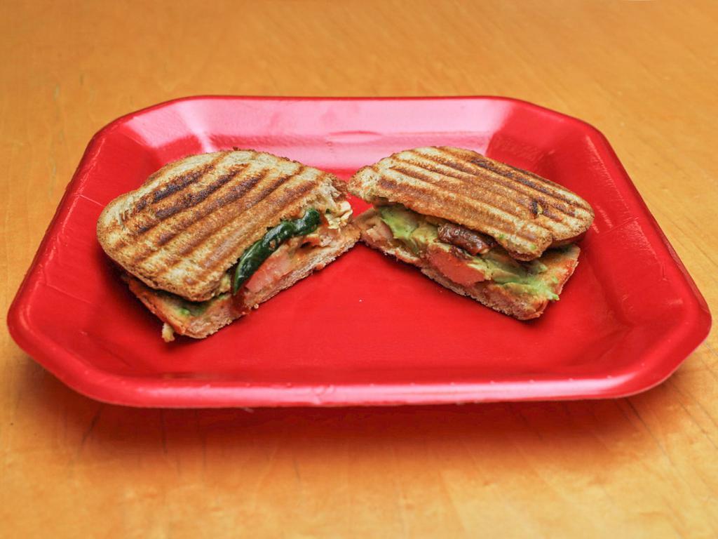 Chipotle Chicken Panini · Grilled chicken, sun-dried tomatoes, spinach, avocado, and chipotle mayo.