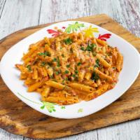 Penne A la vodka · SERVED WITH PENNE, BACON , TOMATO CREAM SAUCE WITH A HINT OF VODKA,
,SERVED WITH BREAD,
ONLY...