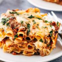Baked Ziti with Meat Sauce · Baked Ziti,
MEAT SAUCE,
Served with Garlic bread 
