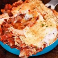 Eggplants Parmigiana Entrees · Veggie Eggplants Baked with Melted Mozzarella and tomato sauce.
Served with Garlic Bread and...