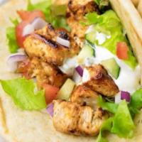 CHICKEN GYRO · GRILL CHICKEN ON PITA BREAD, WITH LETTUCE, TOMATO, ONION AND TZATZIKI SAUCE.