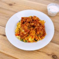 Chicken Biryani · Boneless chicken, aromatic rice pilaf served with curry sauce.