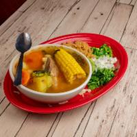 Bowl of Caldo de Res · Homemade fresh beef vegetable soup served with shank meat and rice.