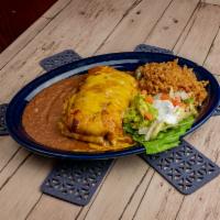 Chimichanga · Ground beef or broiled chicken in a flour empanada then deep-fried and topped with American ...
