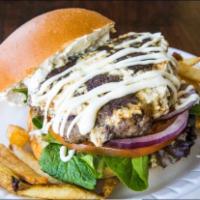 Mediterranean Burger · 1/2 lb. beef patty with creamy feta mix cheese, mixed greens, tomatoes, and onions