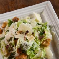 Classic Caesar Salad · Romaine, shaved Parmesan, garlic croutons and Caesar dressing.