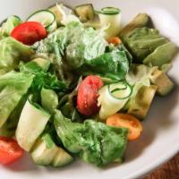 Avocado Salad  · Boston lettuce, avocado, rainbow tomato, shaved cucumbers, lime vinaigrette dressing