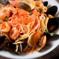 Mixed Seafood Pasta · Clams, mussles, calamari, shrimp, marinara sauce.