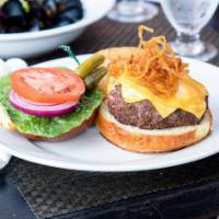 Aged Burger · 10 oz. Certified black Angus meat, lettuce, tomato, onion, and fries with a choice of cheese.