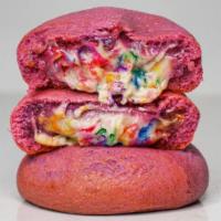 Unicorn Cookie Duchess Cookie · Amazing pink sugar cookie stuffed with creamy strawberry cheesecake and rainbow sprinkles.

