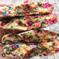 Funfetti Duchess Cookie · Traditional sugar cookie stuffed with rainbow sprinkle cookie dough.

