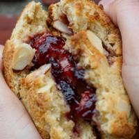 Raspberry Almond Duchess Cookie · Crispy almond cookie stuffed with delicious raspberry jam.