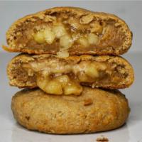 Oatmeal Apple Pie Duchess Cookie · Crispy cinnamon oatmeal cookie stuffed with warm gooey apple pie.
