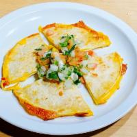 Mulitas · 2 grilled corn tortillas filled with cheddar cheese and topped with pico de gallo.