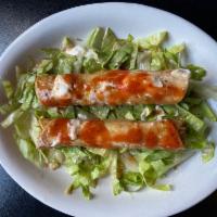 Chicken Taquitos · 2 pieces. Shredded chicken in a rolled crispy corn tortilla topped with salsa and sour cream...