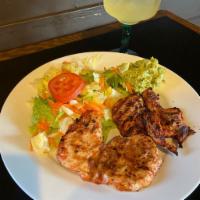Pollo Asado · Butterflied chicken breast marinated an broiled, served with rice , beans and guacamole. Cho...
