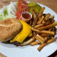 Cheeseburger  ·  8oz patty .Comes with all the fixings & french fries. Add bacon for an additional charge.