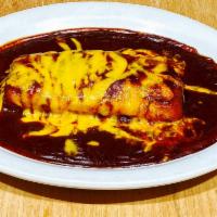 Tamal · Single chicken tamal. Topped with sauce and melted cheddar cheese.