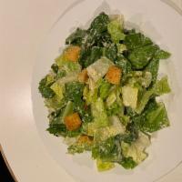 Caesar Salad · Traditional Caesar. Add chicken for an additional charge.