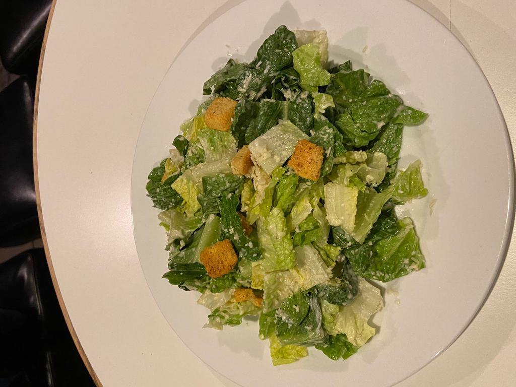Caesar Salad · Traditional Caesar. Add chicken for an additional charge.