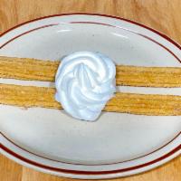  Churros (2) · Mexican pastry sticks. Served with whipped cream.