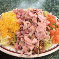 Chef Salad · Mixed greens, carrots, red cabbage, eggs, croutons, tomatoes, chopped bacon, diced ham, slic...