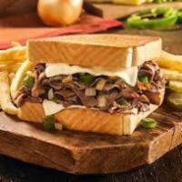 Famous Philly Cheese Steak Sandwich  · Seasoned beefsteak, grilled onions, grilled green peppers and loads of melted Swiss cheese o...