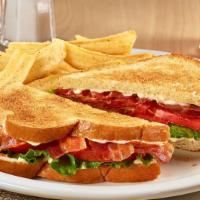 BLT Club Sandwich  · 6 strips of bacon, lettuce, tomato and mayonnaise on sourdough bread.
