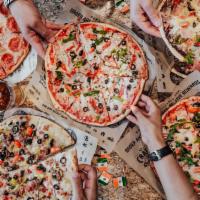 Complete Family Pack ( 4 Pizzas, 2 Salads & 1 Desert Pizza) · Choose Any 4 of our famous Rev Classic Pizzas, 2 Entree Size Chicken Caesar Salads & 1 Desse...