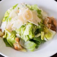 Caesar Salad · Romaine lettuce with shaved Parmesan, croutons and Caesar dressing.