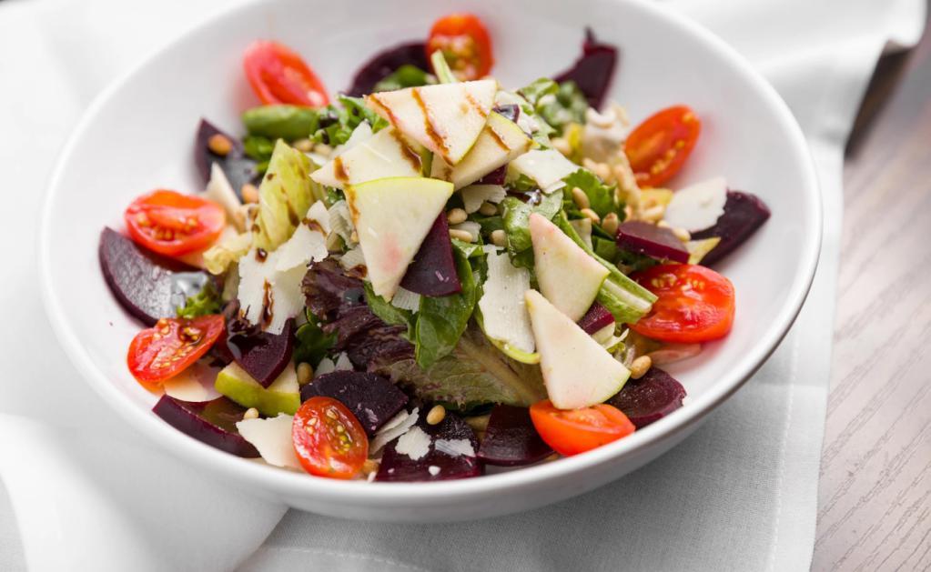 Beet Salad · Fresh beets, mix greens, pine nuts, green apple and shaved Parmesan cheese.
