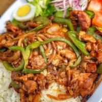 Chicken Teriyaki · Teriyaki Chicken with Onions and Bell Pepper over a bed of Rice. Comes with a choice of Frie...