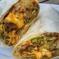 Asada Breakfast Burrito · Includes Scrambled Eggs, Carne Asada, Hashbrowns, Cheese, & side of Salsa. Comment for adjus...