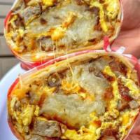 Combo Breakfast Burrito · Meat lover's burrito.  Includes Scrambled Eggs, Bacon, Sausage, Ham, Hashbrowns, Cheese & si...