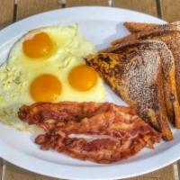 French Toast & Eggs · 4 wedges of French Toast, 3 eggs, and your choice of 3 bacon or 3 sausage.
